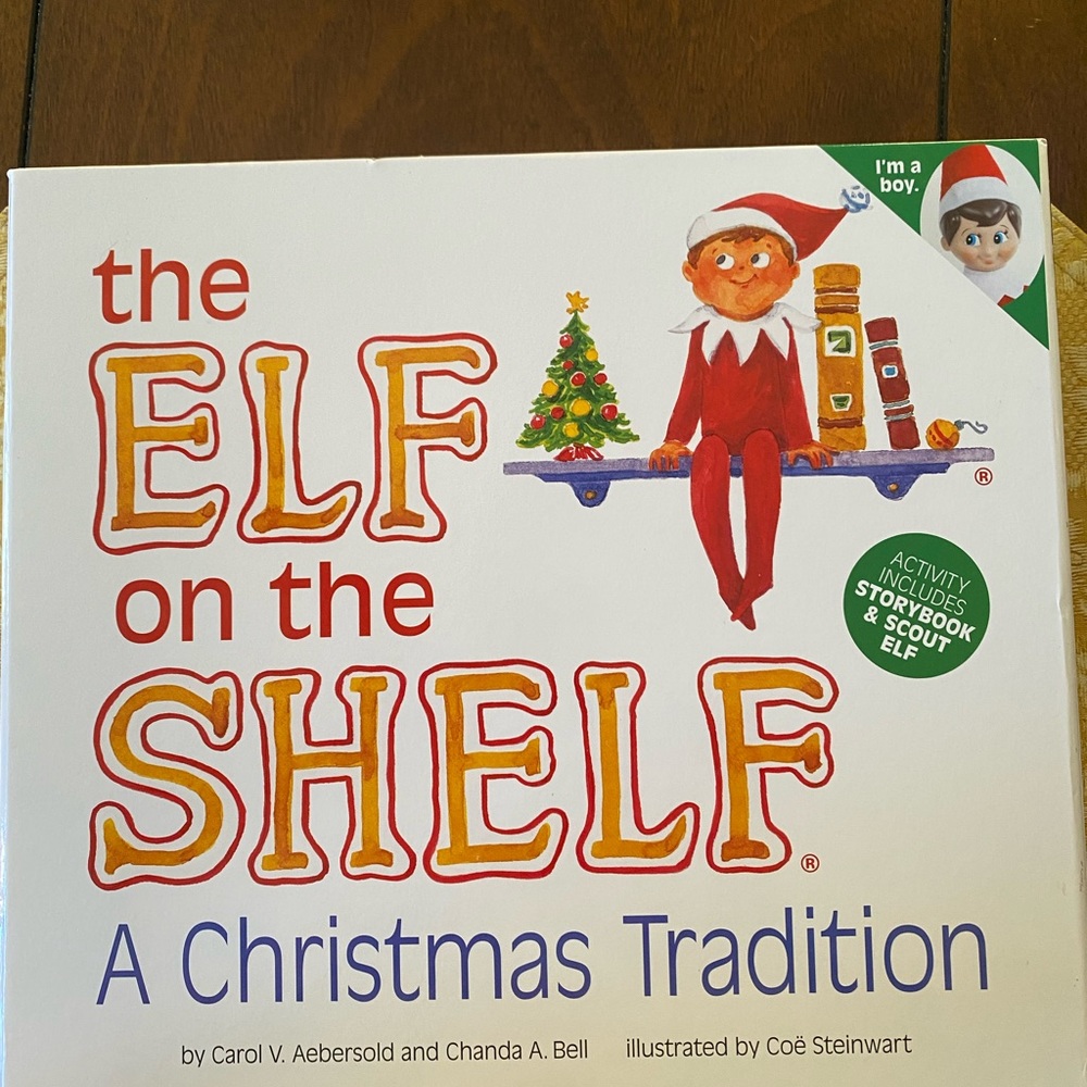 Elf on the shelf with book